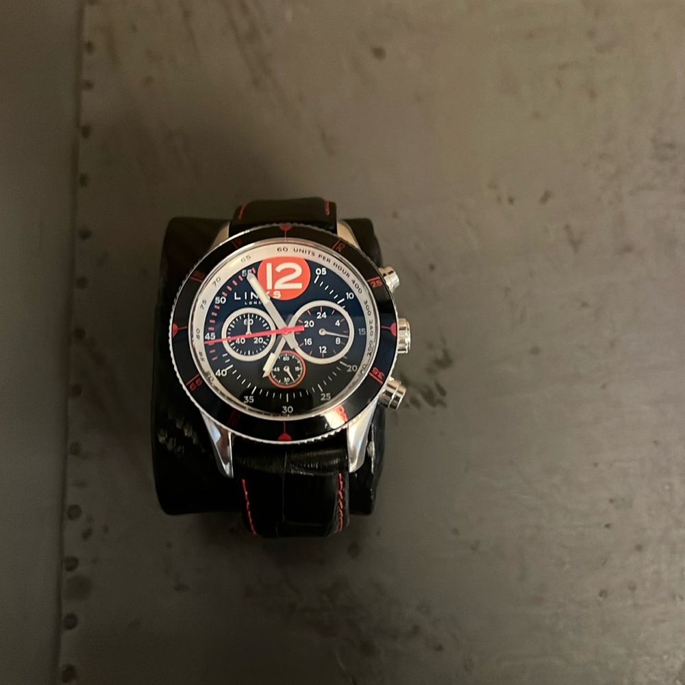 Gently worn Links of London wrist watch quartz black and red